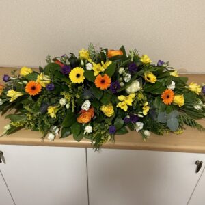 Purple, yellow and orange Casket tribute