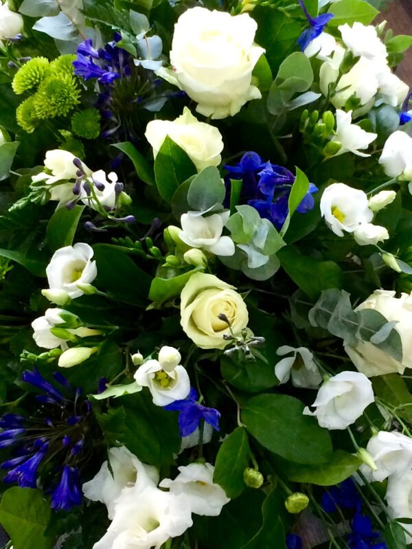 Blue and cream/white Casket tribute