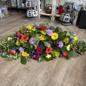 Mixed vibrant Casket tribute