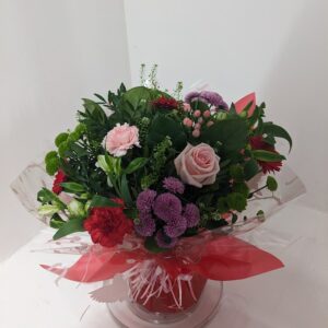 Red, pink, green hand tied bouquet
