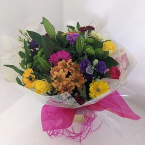 Vibrant hand tied aqua pack bouquet