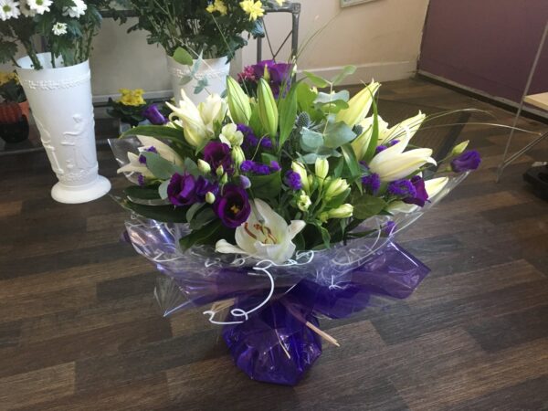 Cream and green and purple hand tied aqua pack