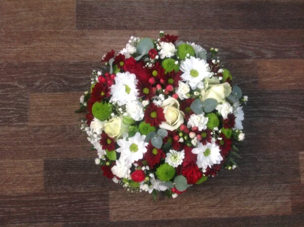 Red, white and green posy